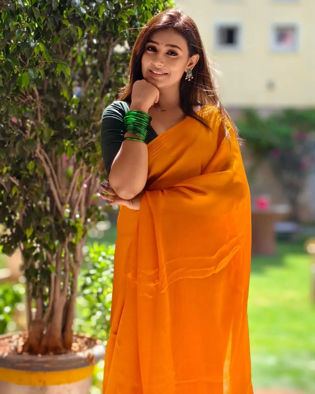 Telugu TV Actress Deepa Jagadeesh Stills In Orange Saree Green Blouse